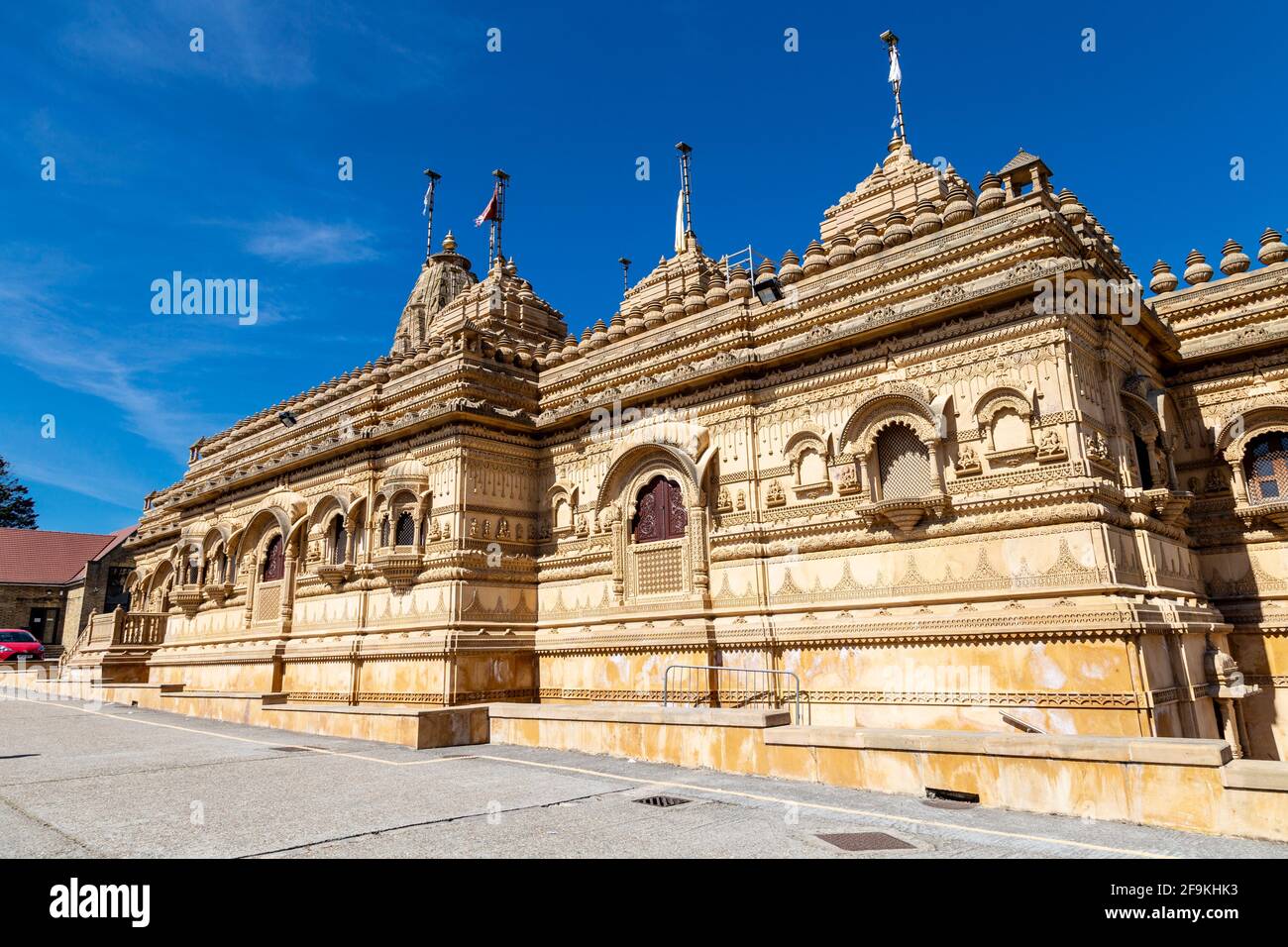 Ornate limestone Hindu temple Shri Vallabh Nidhi Mandir in Alperton, Wembley, London, UK Stock Photo