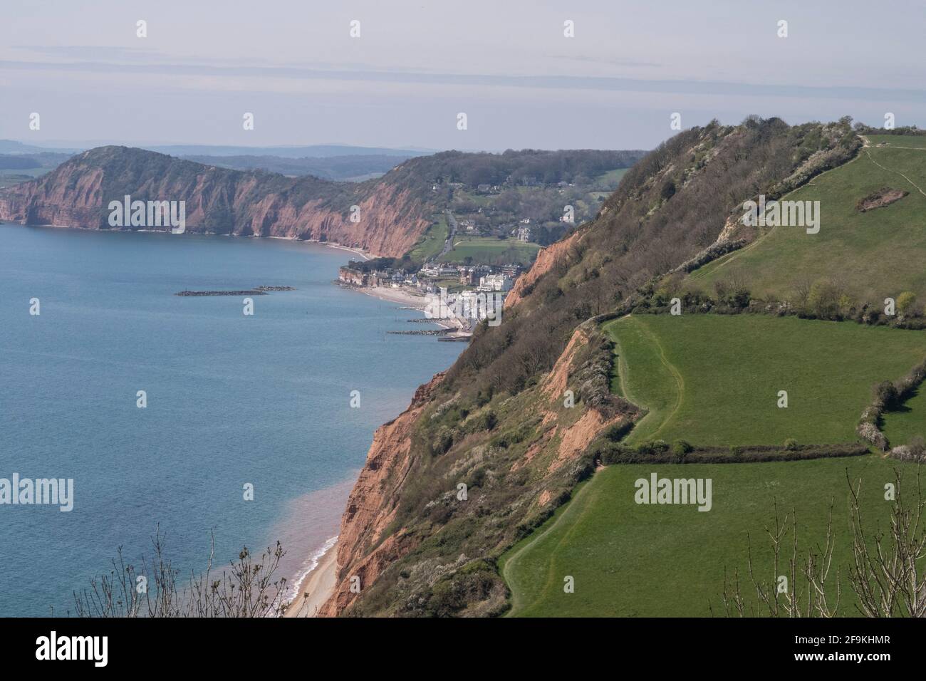 View from Higher Dunscombe Cliff on the South West Coastal path walking route west towards Sidmouth, Devon. Stock Photo
