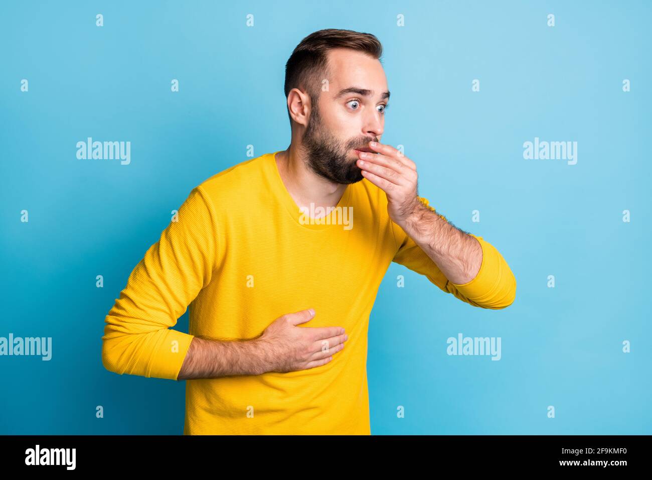 Photo of young handsome shocked surprised amazed man vomit nauseous ...