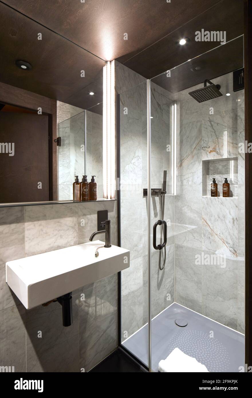 Bathroom interior. Stow-Away Waterloo Hotel, London, United Kingdom. Architect: Doone Silver Kerr, 2019. Stock Photo