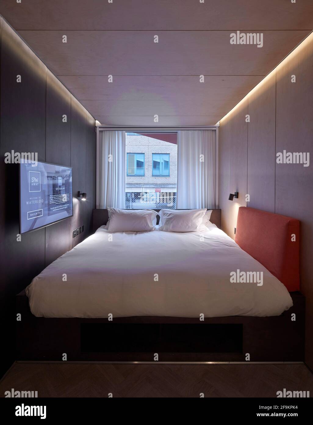 Bedroom. Stow-Away Waterloo Hotel, London, United Kingdom. Architect: Doone Silver Kerr, 2019. Stock Photo