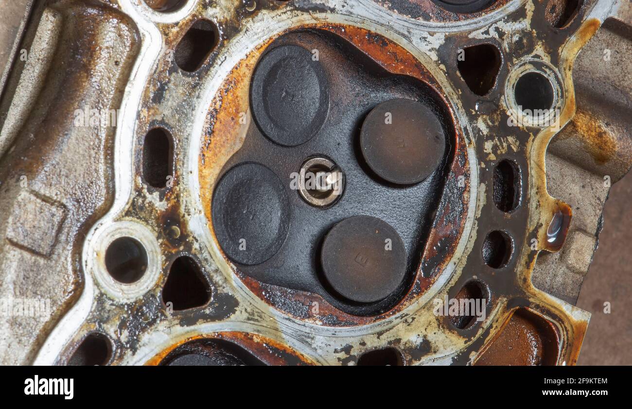 Soot on the car engine cover valves. Car repair Stock Photo Alamy