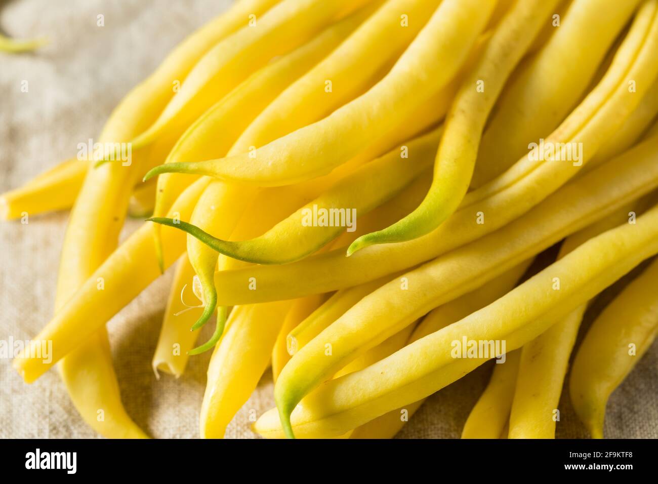 Raw Organic Yellow String Beans in a Bunch Stock Photo Alamy