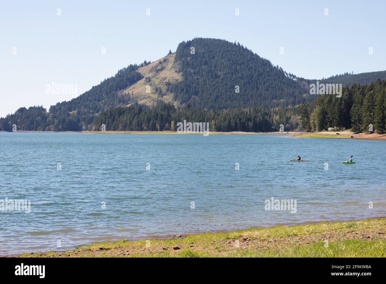 Two people kayaking on Dorena Lake in Cottage Grove, Oregon Stock Photo Alamy
