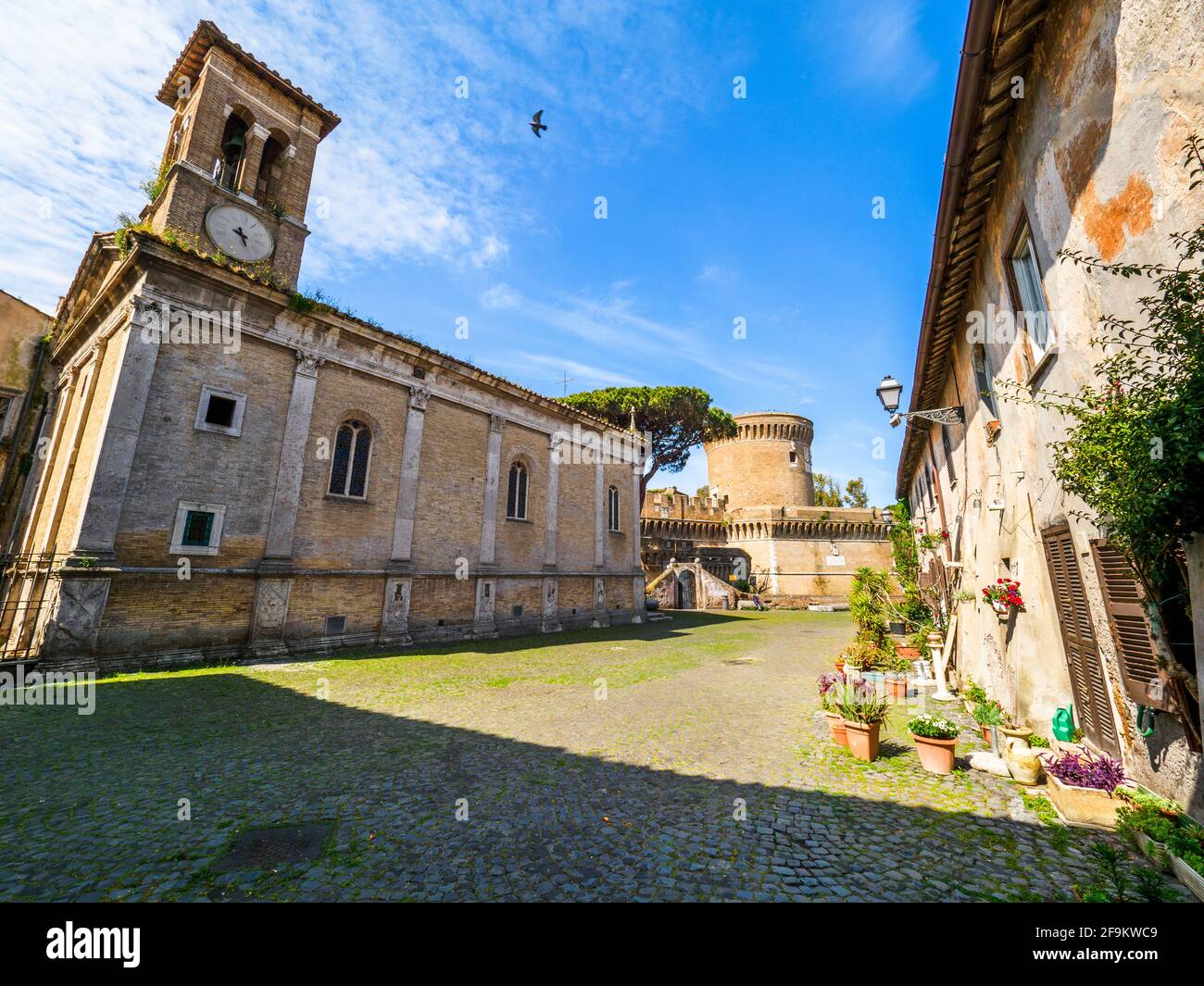 Basilica of Santa Aurea and Castello di Giulio II in Ostia Antica - Rome, Italy Stock Photo