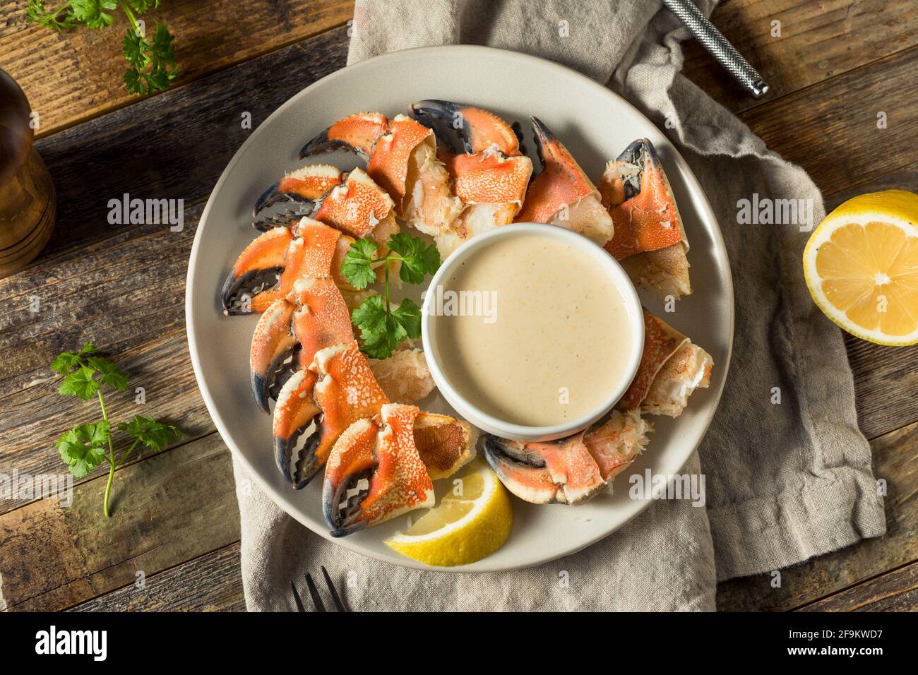 Homemade Steamed Stone Crab Claws with Dipping Sauce Stock Photo