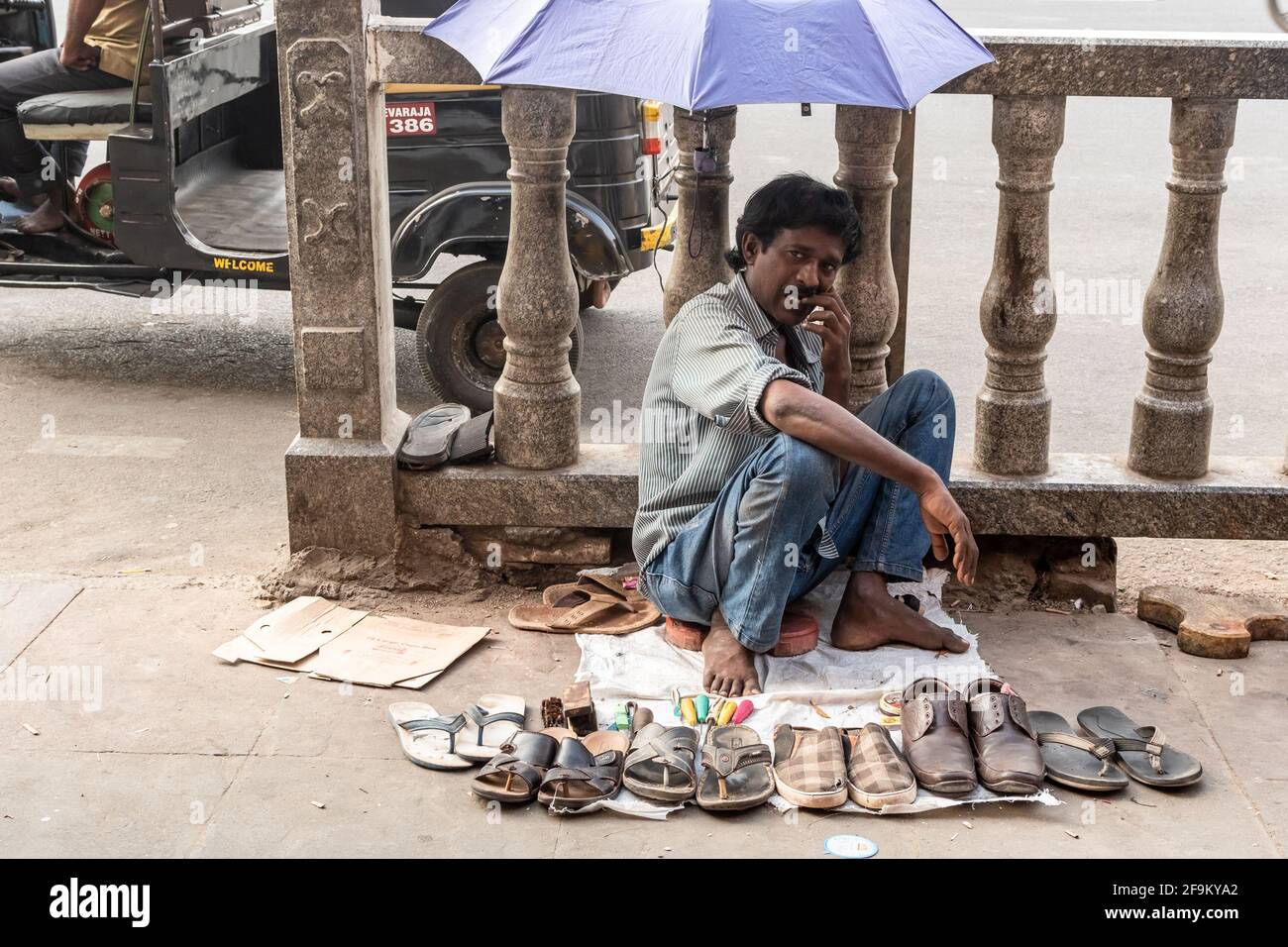 Indian street cobbler hires stock photography and images Alamy