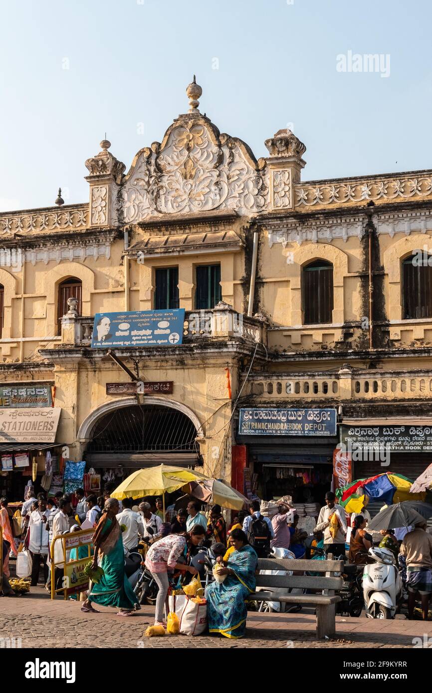 Mysuru, Karnataka, India - January 2019: Crowds of people outside the ancient Devaraja Market in the city of Mysore. Stock Photo