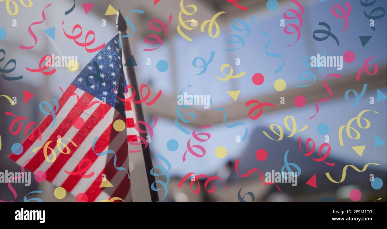Composition of party streamers over american flag Stock Photo Alamy