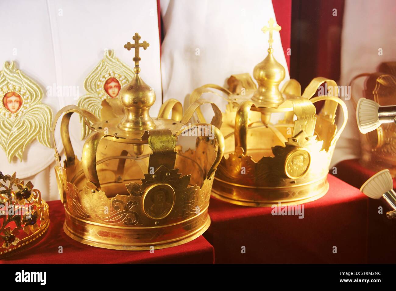 Crown on a red background Stock Photo - Alamy