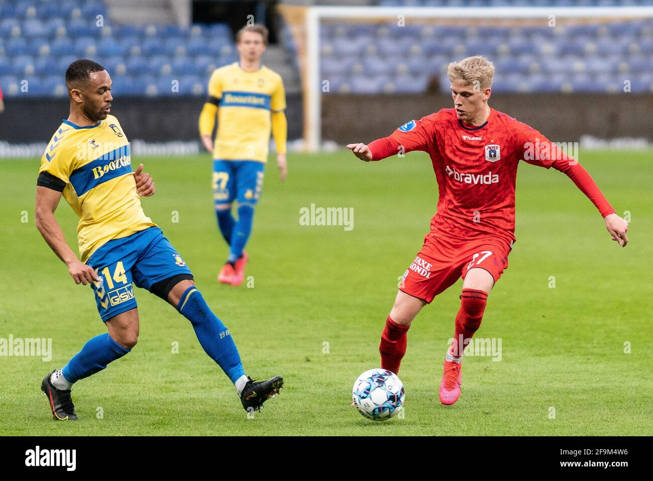 Brondby, Denmark. 18th Apr, 2021. Albert Gronbaek (27) of Aarhus GF and Kevin Mensah (14) of Brondby IF seen during the 3F Superliga match between FC Brondby IF and Aarhus GF Brondby Stadion in Brondby. (Photo Credit: Gonzales Photo/Alamy Live News Stock Photo