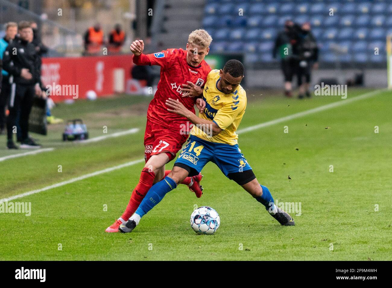 Brondby, Denmark. 18th Apr, 2021. Albert Gronbaek (27) of Aarhus GF and Kevin Mensah (14) of Brondby IF seen during the 3F Superliga match between FC Brondby IF and Aarhus GF Brondby Stadion in Brondby. (Photo Credit: Gonzales Photo/Alamy Live News Stock Photo