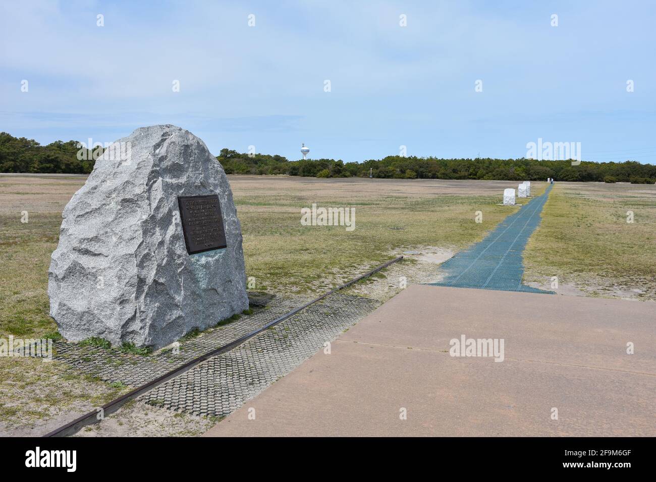 The First Flight Boulder showing the path of the first flight of the Wright Brothers. Stock Photo