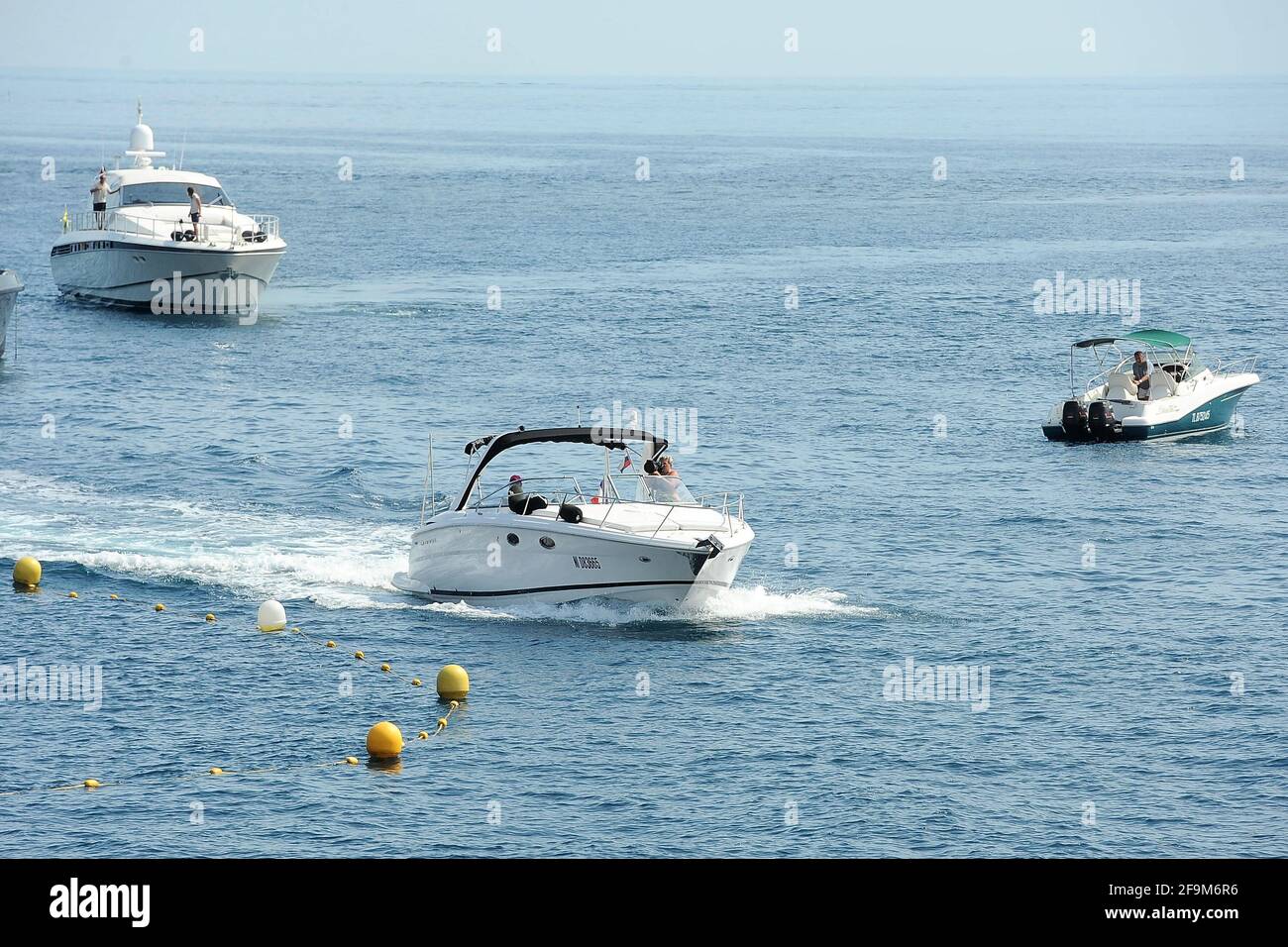 18th May 2011. Paparazzi, Photographers on the boats by the hotel du Cap Eden Roc, Antibes, France Stock Photo