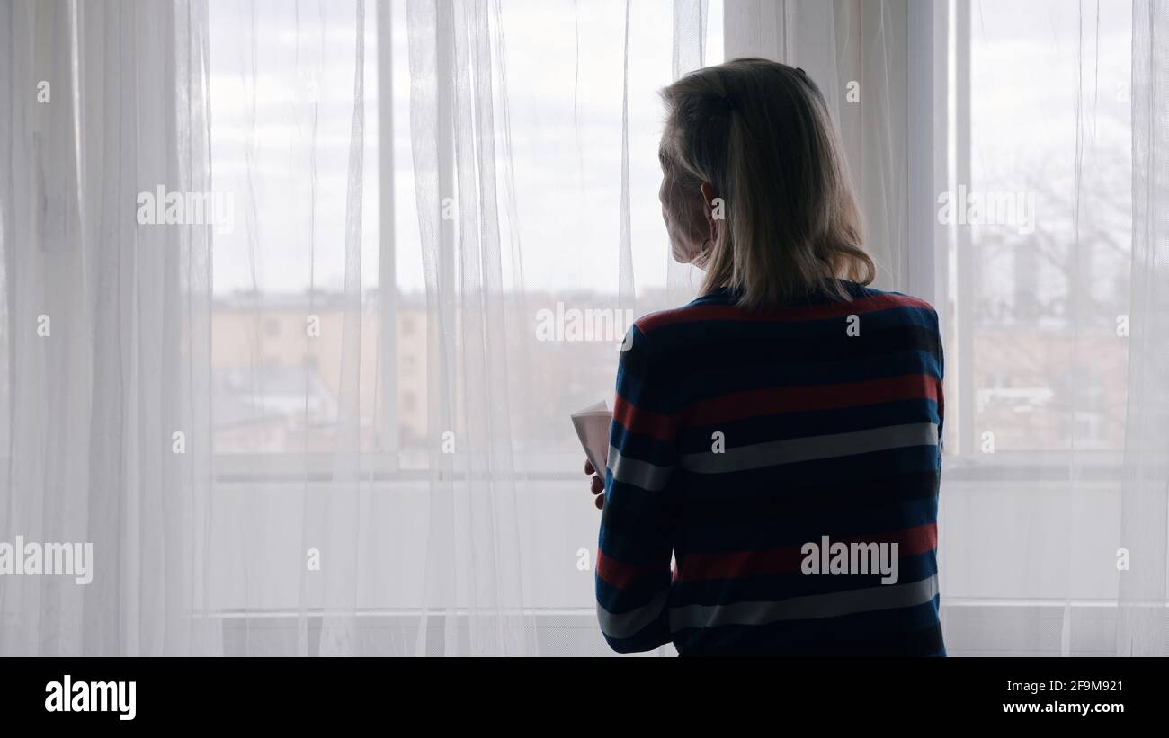 Elderly woman home lonely hi-res stock photography and images - Alamy