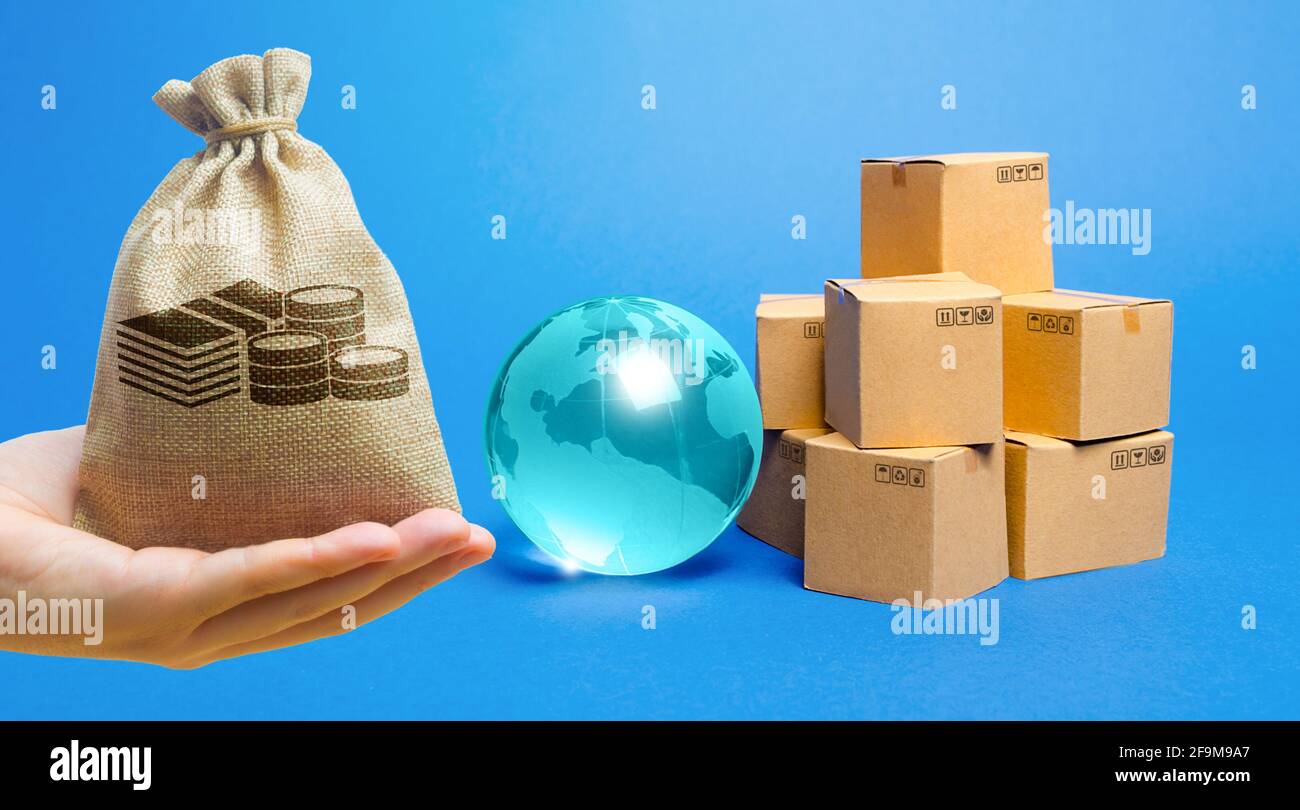 Money bag, blue glass globe and cardboard boxes. International world trade distribution. Delivery of goods, shipping. Global economy, import export fr Stock Photo