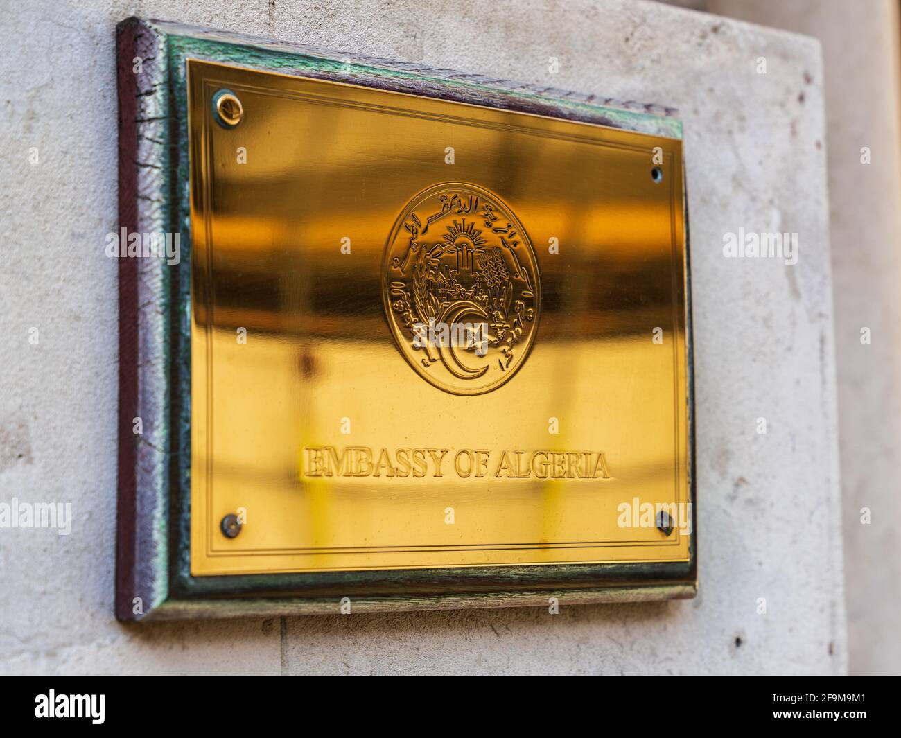 Algerian Embassy London - Brass Sign on the Embassy of Algeria at Riding House St, Marylebone, London UK. Stock Photo