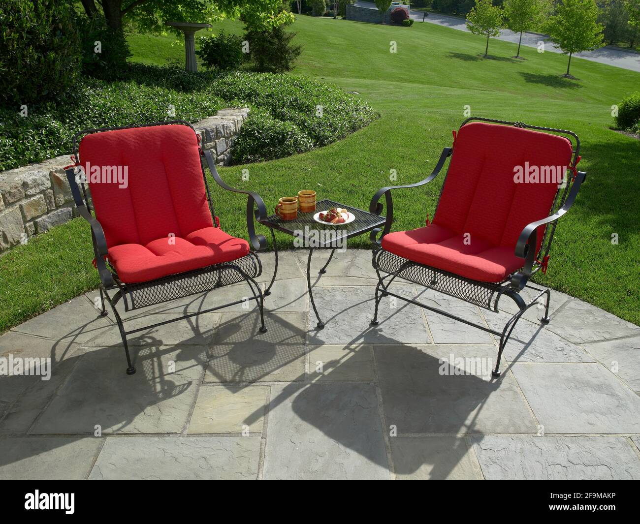 Outdoor furniture on stone patio, Pennsylvania, USA Stock Photo