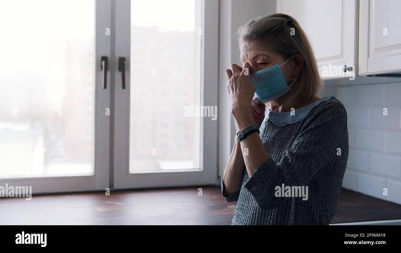 Elderly lonely woman putting on hi-res stock photography and images - Alamy
