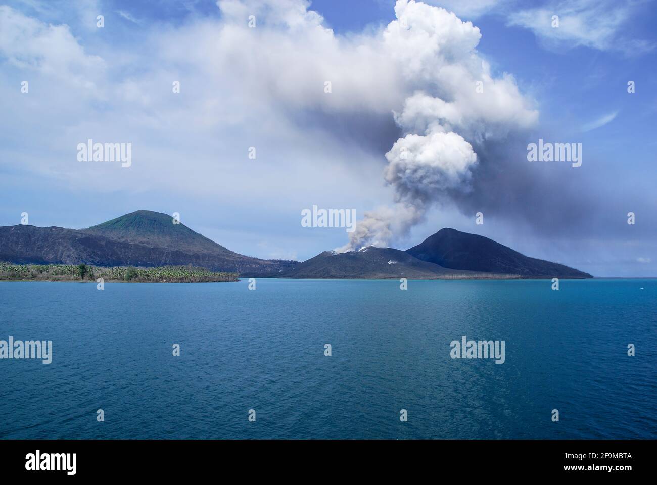 Mt Tavurvur active volcano as seen from the Pacific after leaving Rabaul; Papua New Guinea; Stock Photo