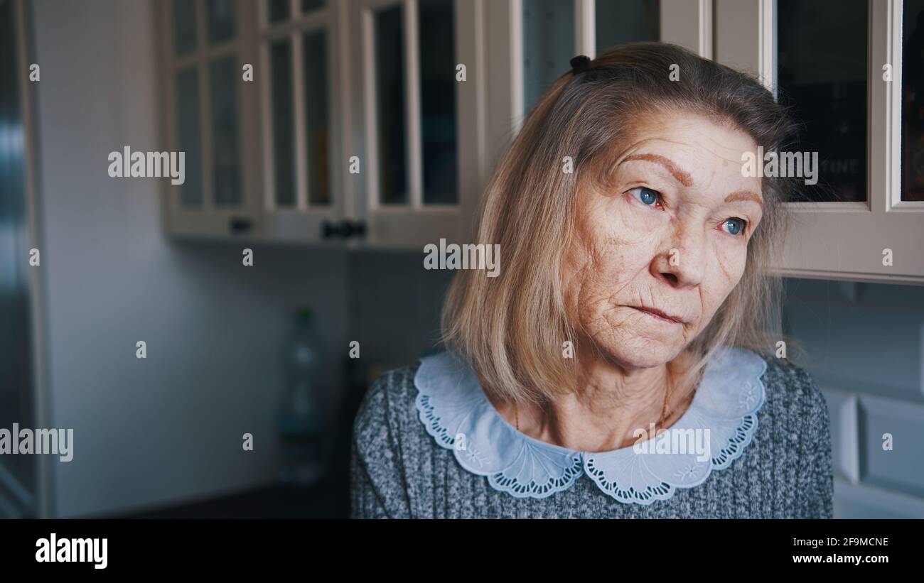 Sad lonely old gray haired hi-res stock photography and images - Alamy