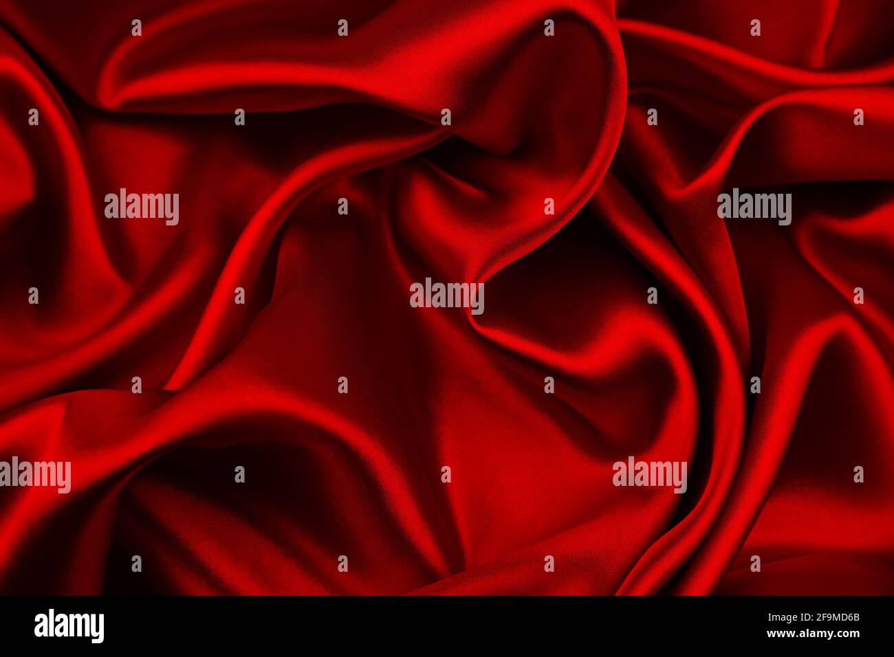 Rippled red silk fabric hi-res stock photography and images - Alamy