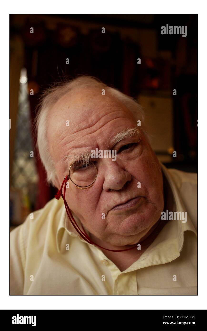 Patrick Moore in his home in Selsey. Pic DAVID SANDISON. 14/2/2005 Stock Photo