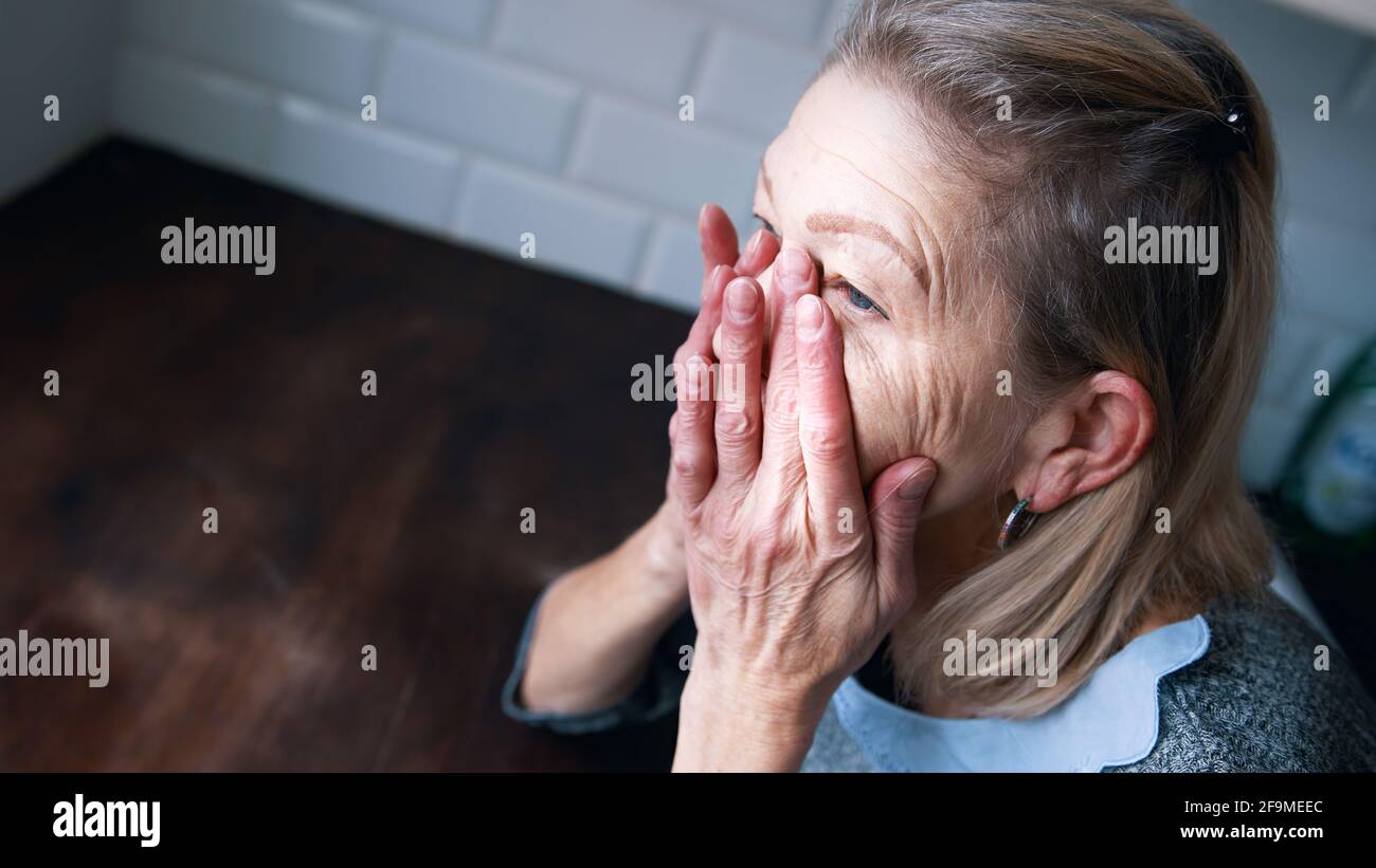 Desperate older woman hi-res stock photography and images - Alamy