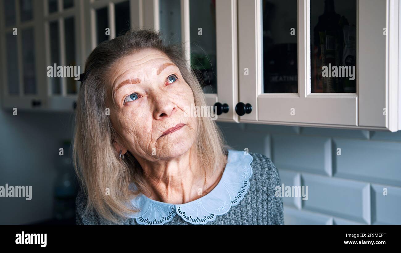 Sad lonely old gray haired hi-res stock photography and images - Alamy