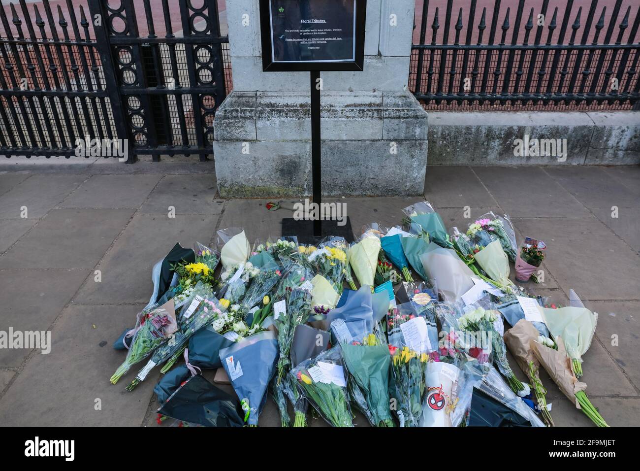 London, UK. 17 April 2021. Flowers and message tributes laid by people