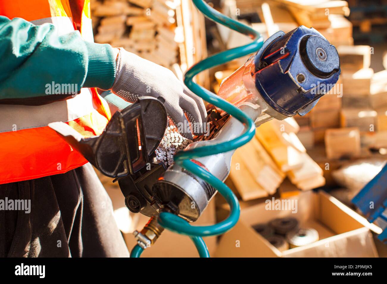 Pneumatic nail gun hires stock photography and images Alamy