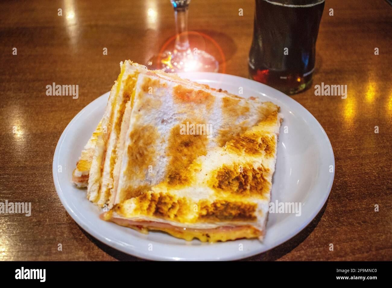 Carlito of ham and cheese (typical toast from Rosario, Argentina). Stock Photo