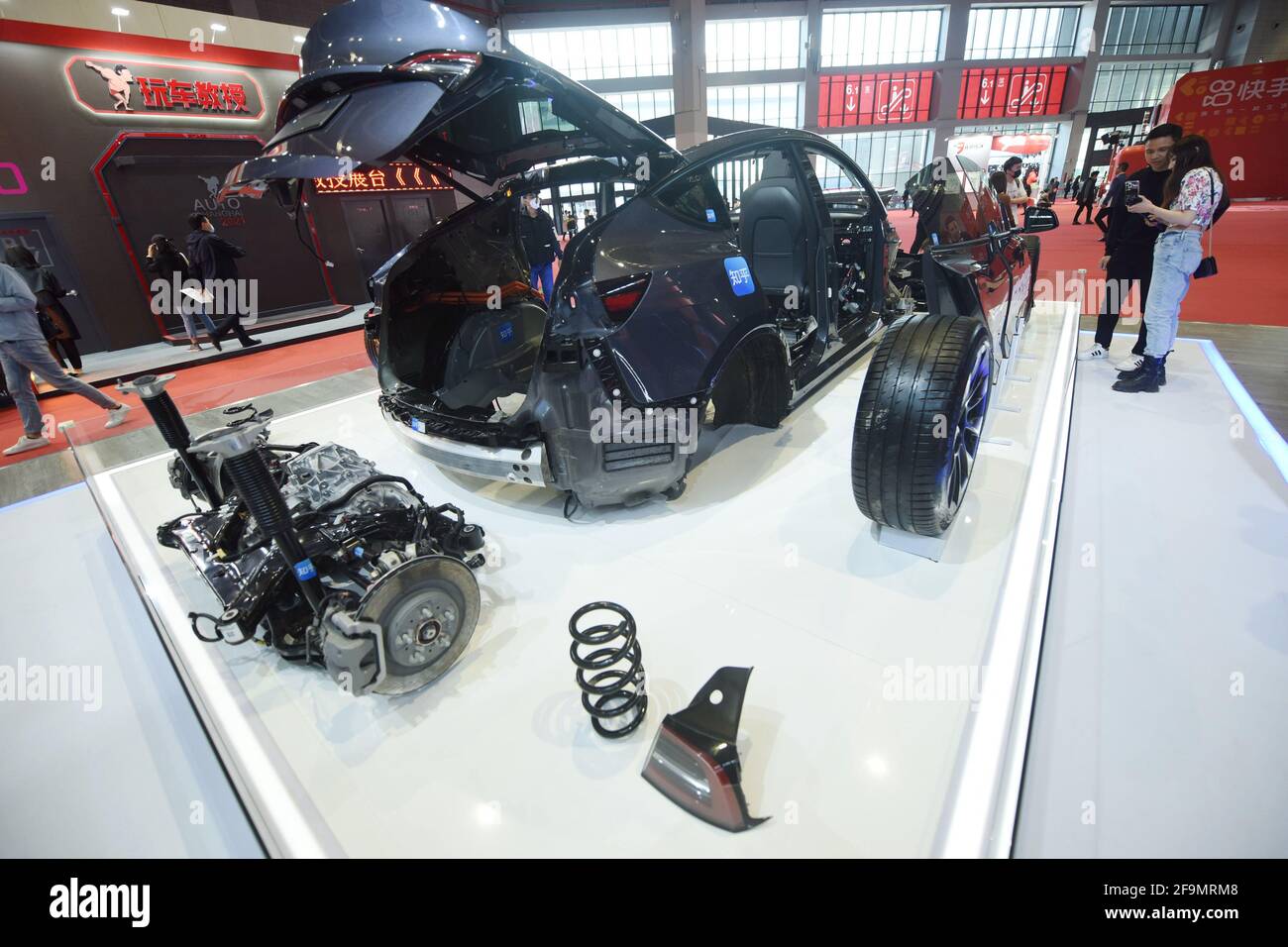 SHANGHAI, CHINA APRIL 19, 2021 Visitors look at a dismantled