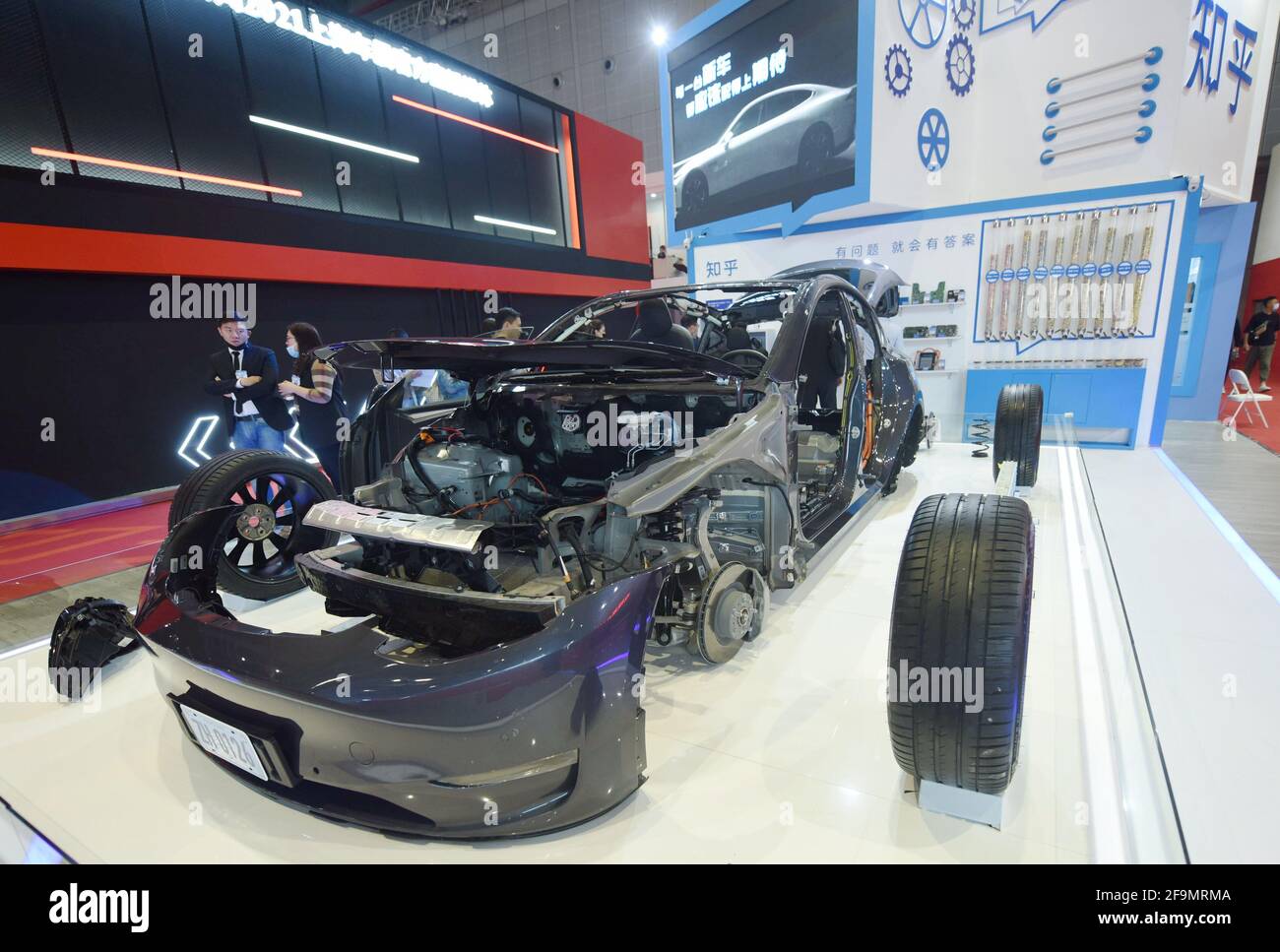 SHANGHAI, CHINA APRIL 19, 2021 Visitors look at a dismantled