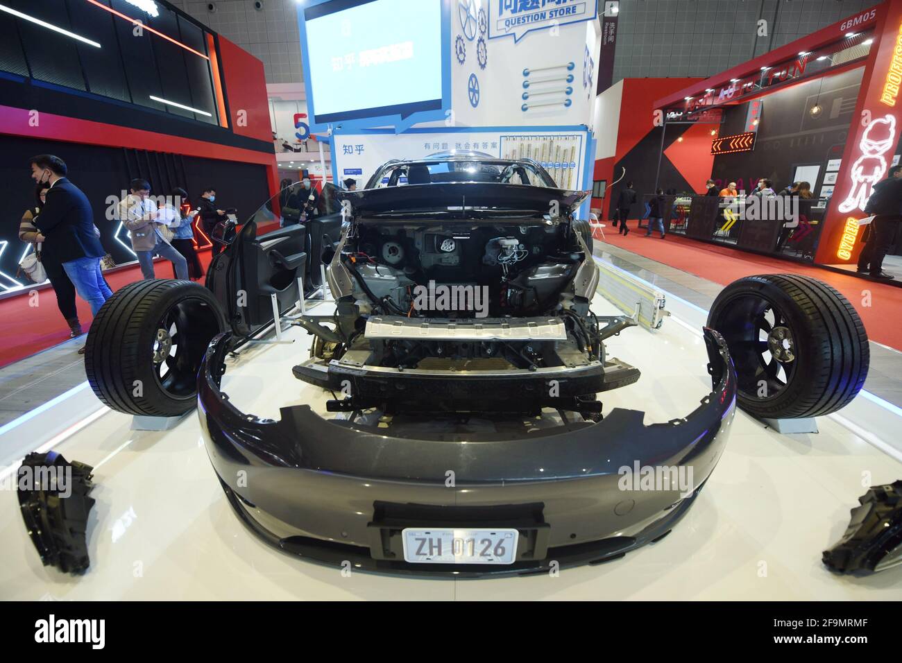 SHANGHAI, CHINA APRIL 19, 2021 Visitors look at a dismantled