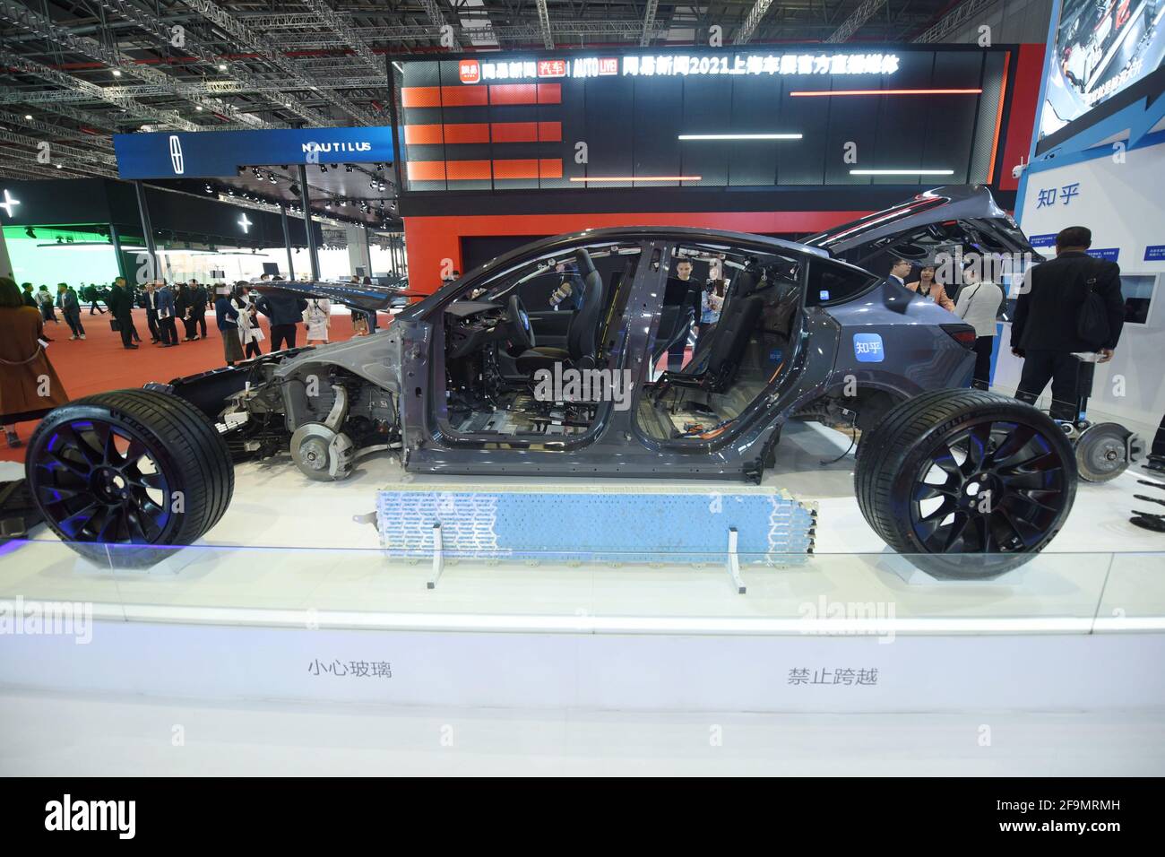 SHANGHAI, CHINA APRIL 19, 2021 Visitors look at a dismantled