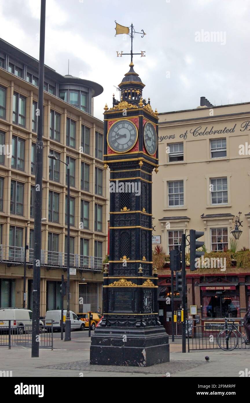 The 'Little Ben' clock tower in the Victoria district Westminster, central London. Made of cast iron in 1892, the clock stands at a cross roads close Stock Photo