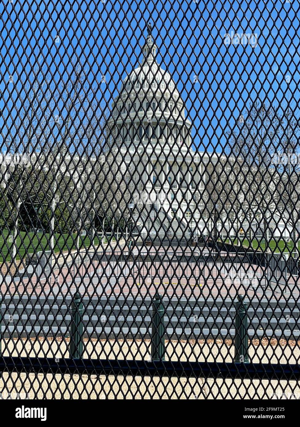 Washington, DC - Apr 3 2021: New security and fencing in place at the Nation's Capitol after the building was stormed by Trump-supporting rioters. Stock Photo