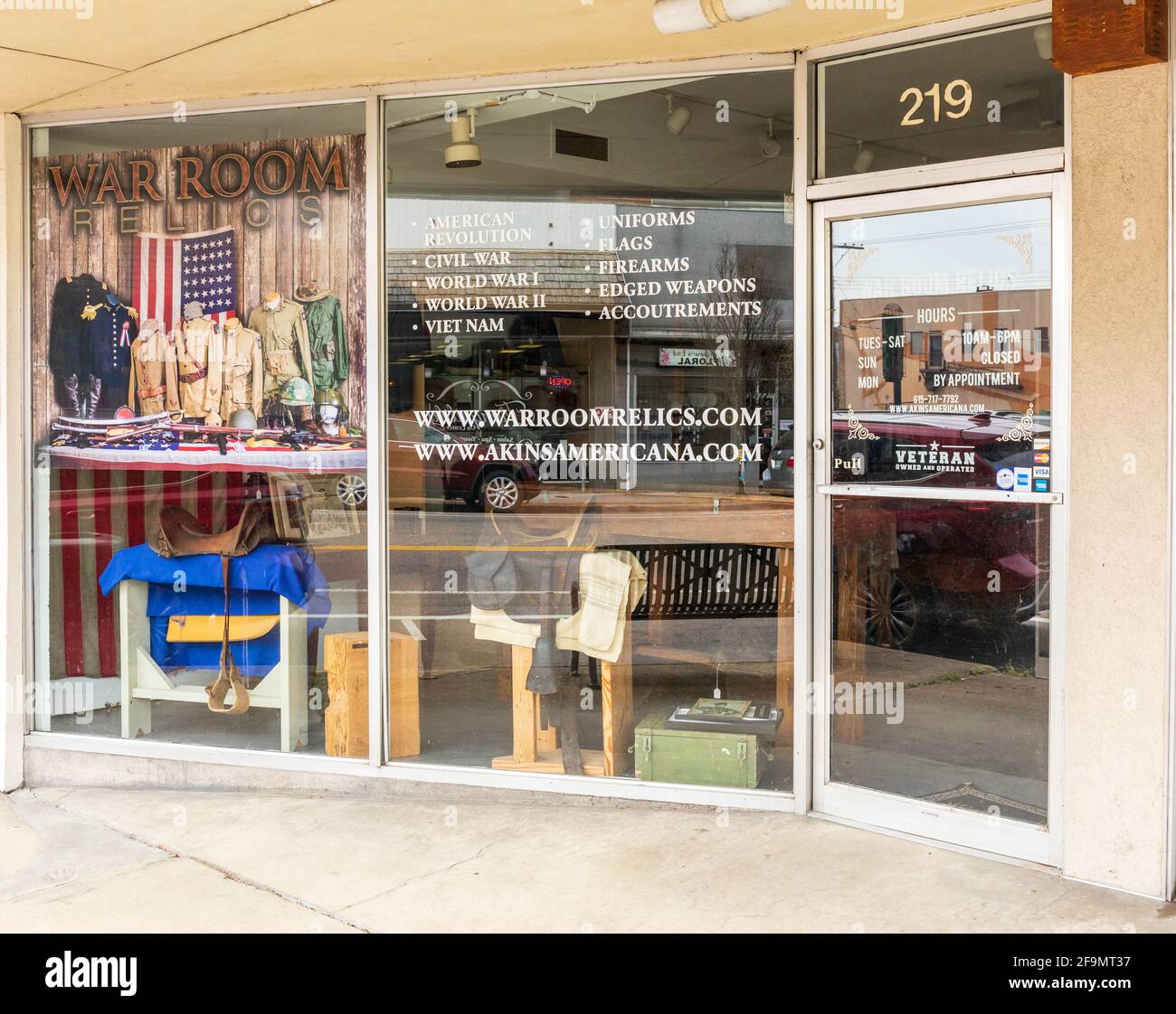 KINGSPORT, TN, USA--8 APRIL 2021: A small shop called 'War Room Relics', selling memorabilia from America's wars. Showing windowed front and door. Stock Photo