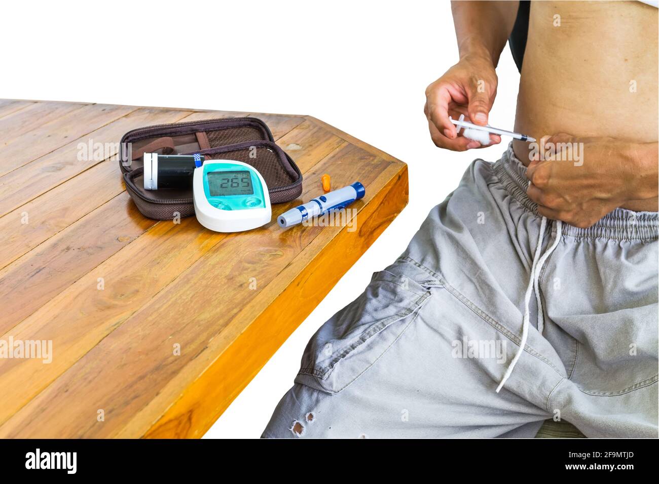 Diabetes patient gets an insulin injection in abdomen area and