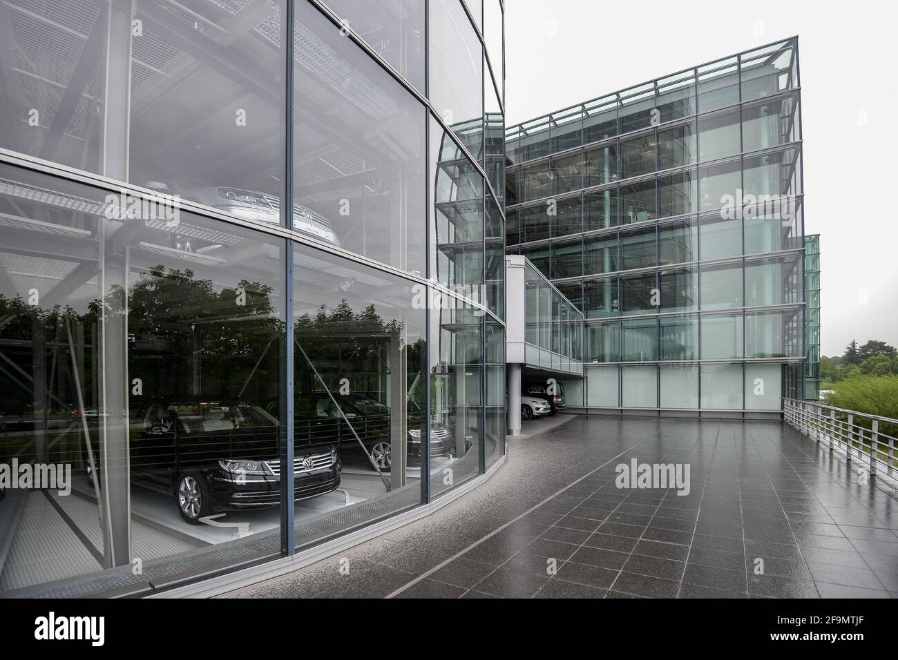 GERMANY DRESDEN - AUGUST 2015: Car in a showroom of the Volkswagen building, car behind glass. Glaeserne Manufaktur. Glass manufactory Volkswagen.  Stock Photo