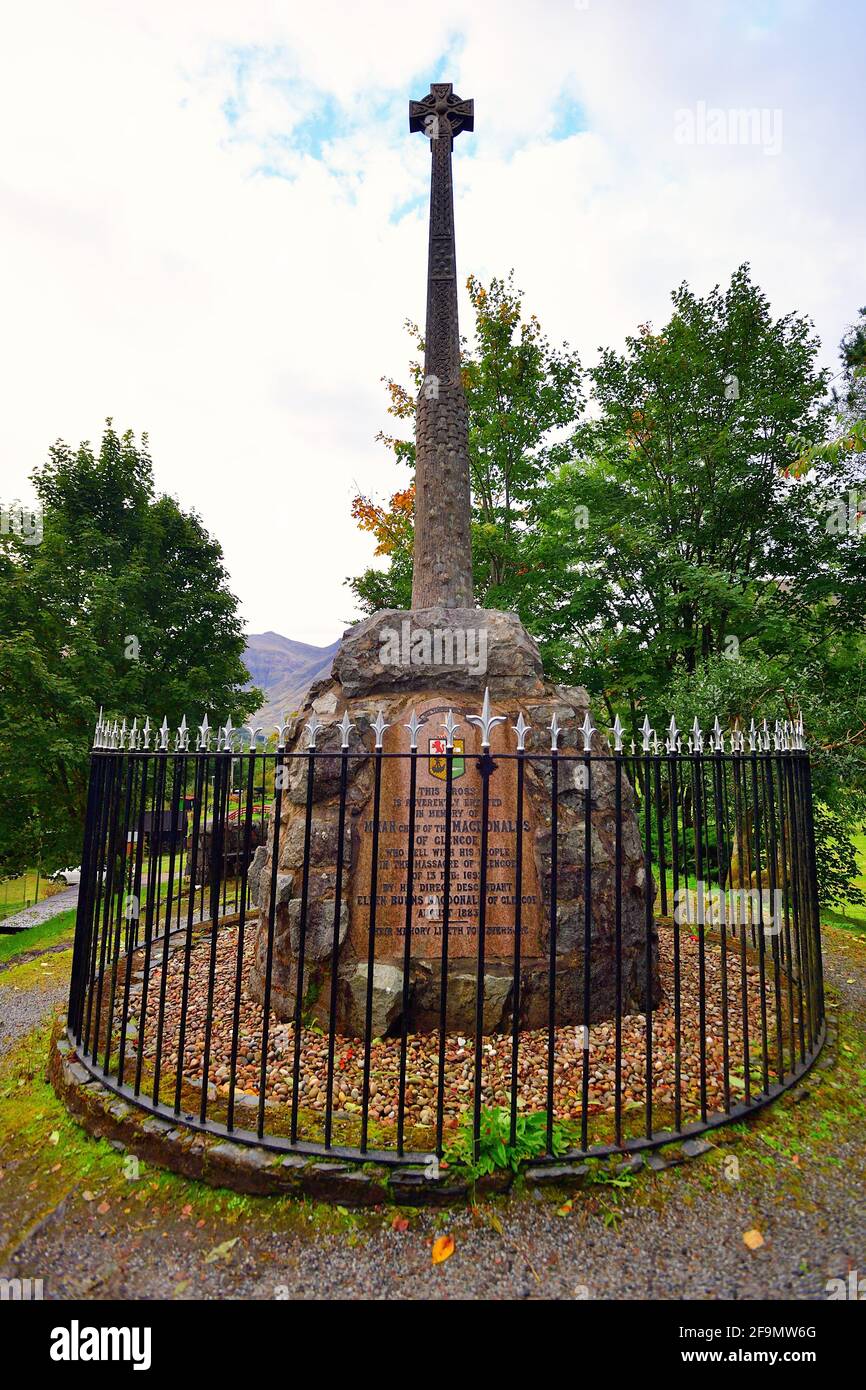 Glencoe, Scotland, United Kingdom. Cross and monument commemorating the The Massacre of Glencoe that took place in the area in 1692. Stock Photo
