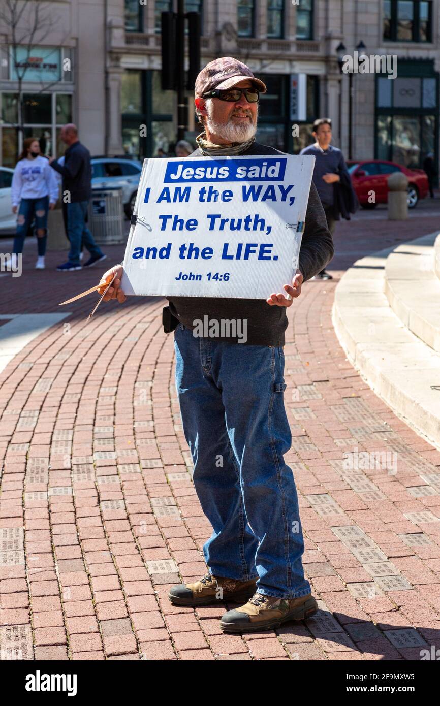 A street evangelist proclaims the Good News message on Monument Circle in downtown Indianapolis, Indiana, USA. Stock Photo