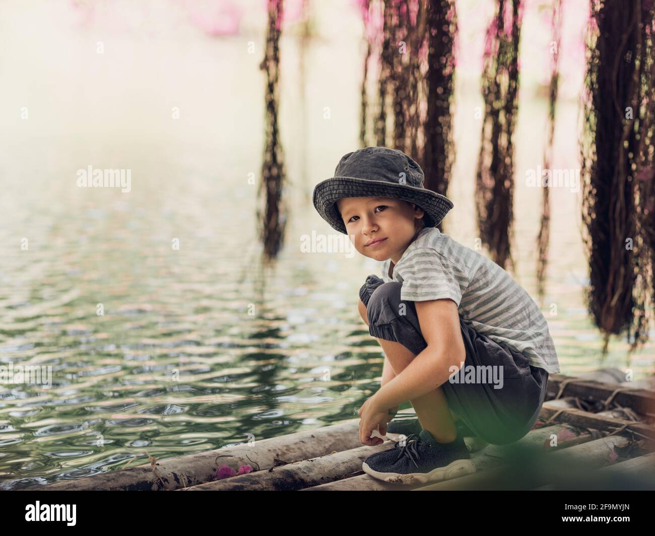 Outdoor portrait of a cute boy smiling Stock Photo - Alamy