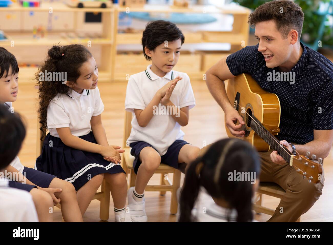 Music class in kindergarten Stock Photo - Alamy