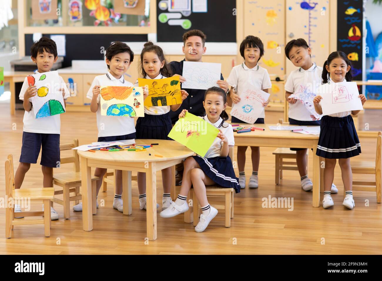 Children having art class in classroom Stock Photo - Alamy