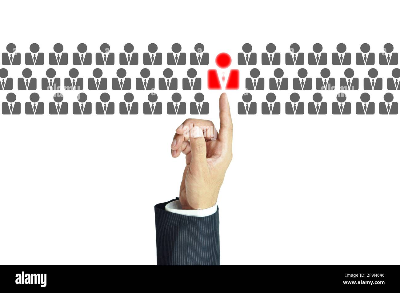 Businessman hand pointing on red human icon - stand out from the crowd, HR and HRM concepts Stock Photo