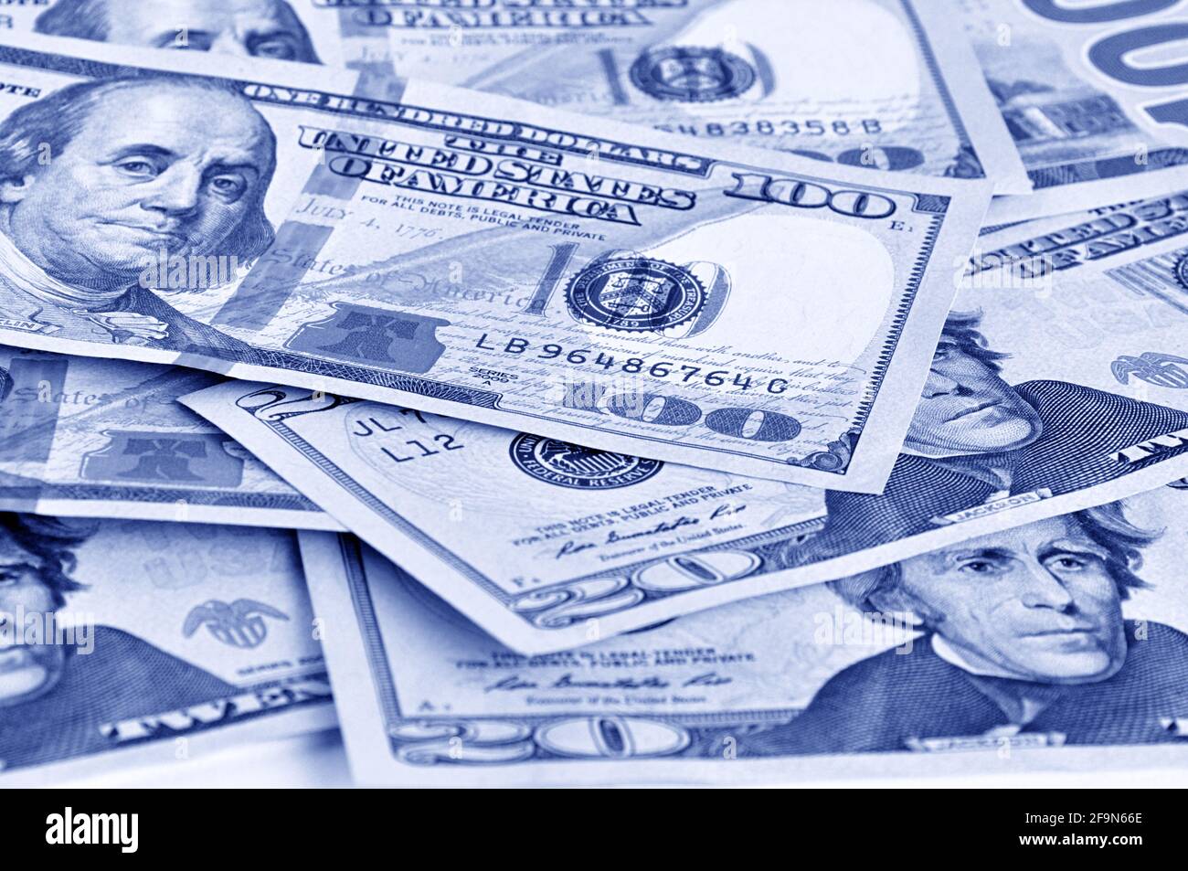Money - United States dollars (USD) bills in retro blue color effect Stock Photo