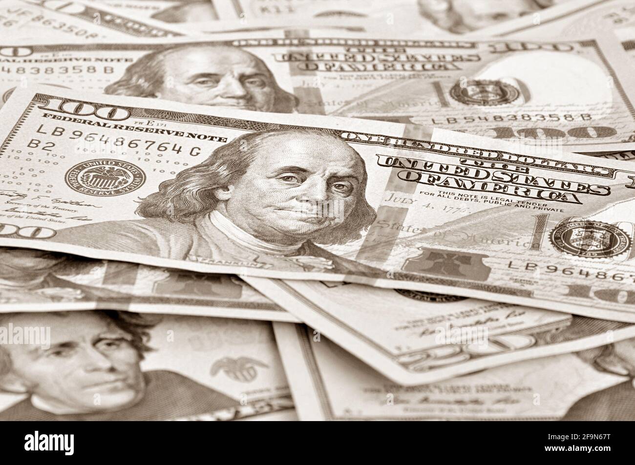 Money - United States dollars (USD) bills in retro style sepia effect Stock Photo