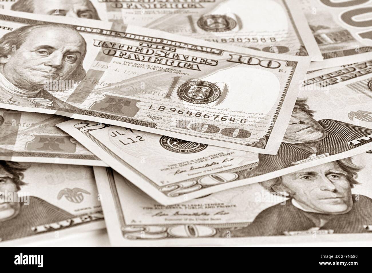 Money - United States dollars (USD) bills in retro style sepia effect Stock Photo